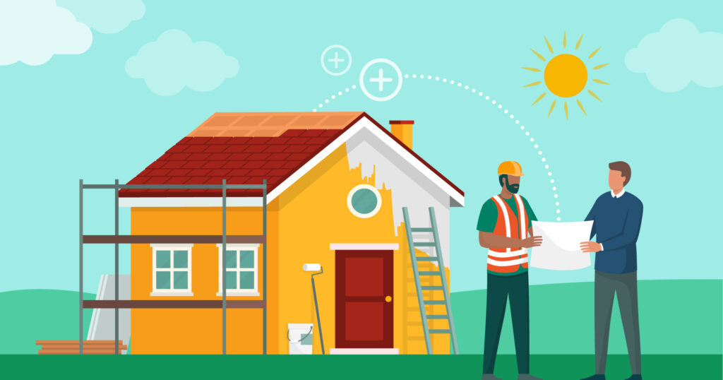 施工業者とお客様が施工中の家の前で打ち合わせしている画像