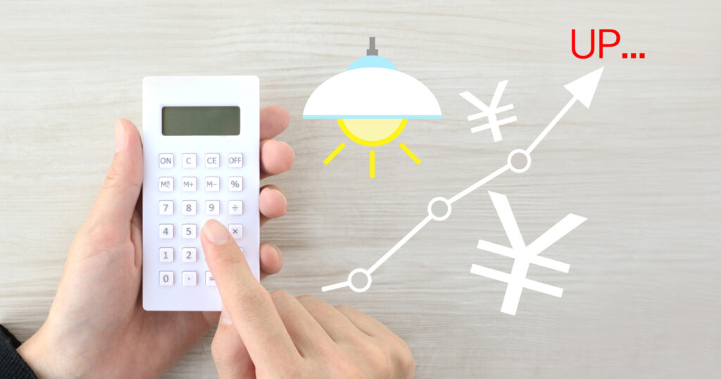 電卓で計算している写真